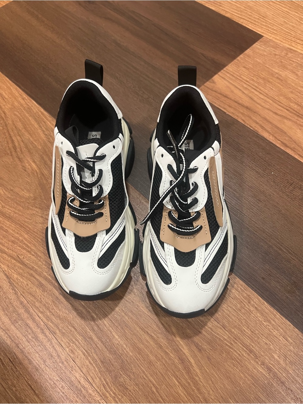 Steve Madden women’s Chunky Lace-Up Sneakers in White, Black & Tan
